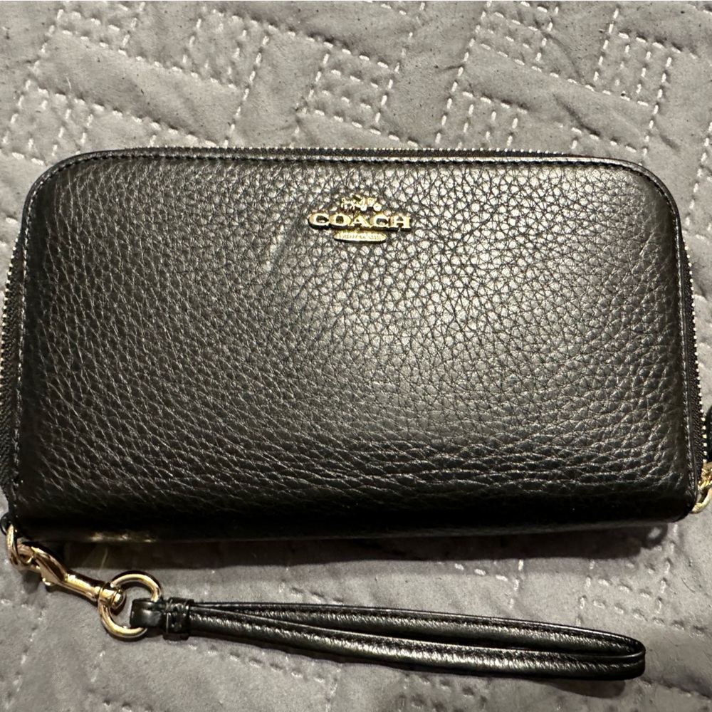 Coach double zip wallet. Only used a short time.